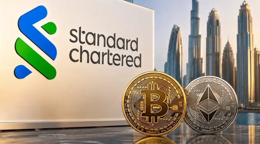 Bitcoin and Ethereum commemorative tokens positioned in front of a Standard Chartered logo and the Dubai skyline.