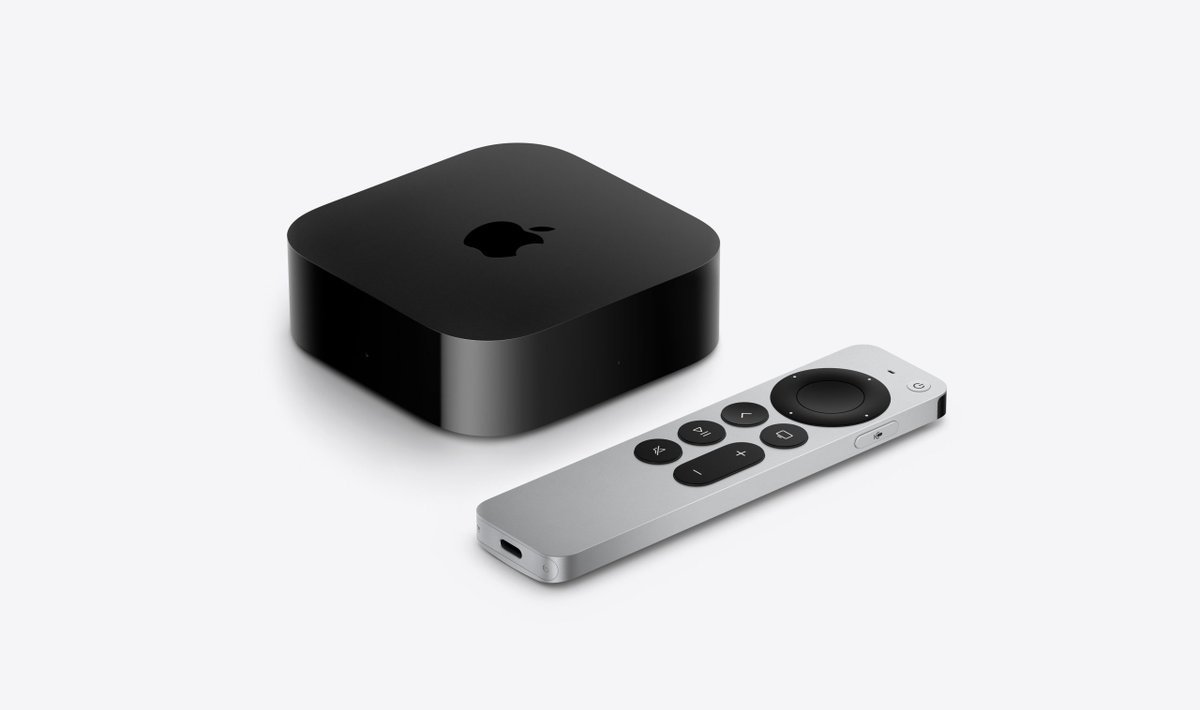 An Apple TV 4K box set next to an aluminum Siri Remote against a plain light gray background.