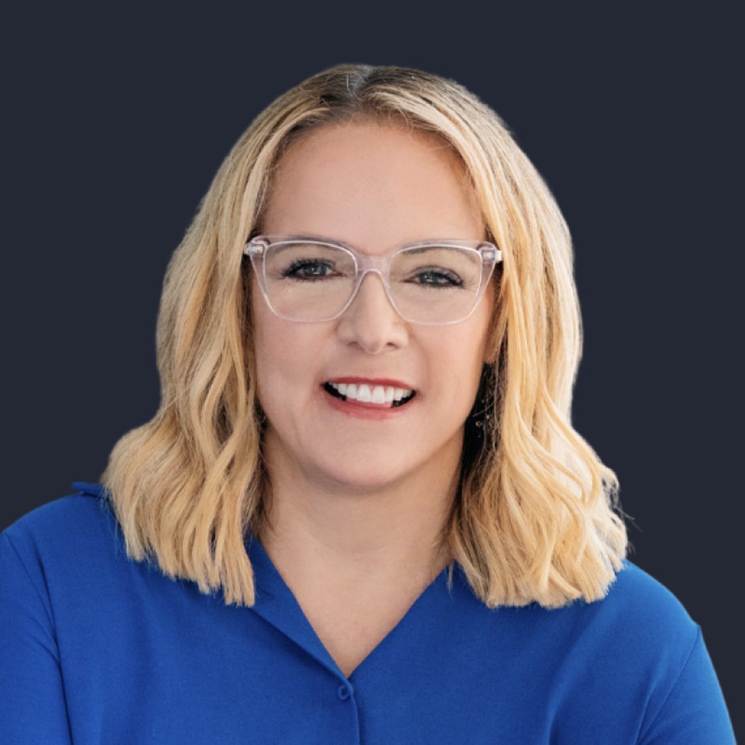 Portrait of Summer Mersinger, CEO of the Blockchain Association, against a dark background.