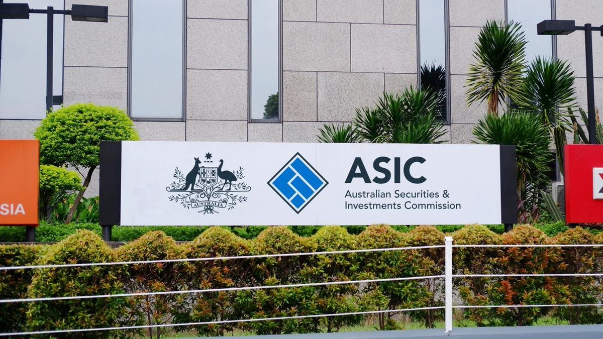 A sign outside a building displaying the Australian coat of arms, the blue logo, and the name Australian Securities and Investments Commission (ASIC).