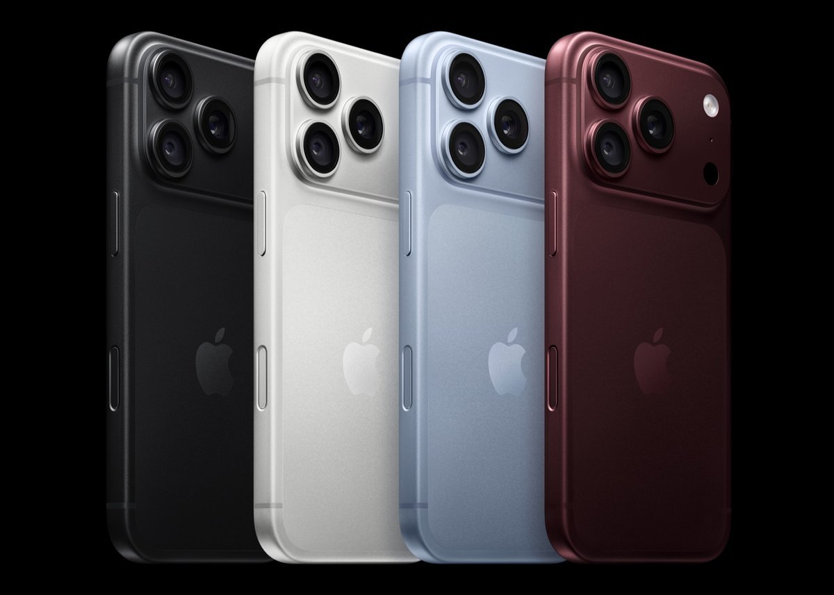 Render of Apple iPhone 18 Pro devices lined up in black, white, light blue, and deep red finishes against a black background.