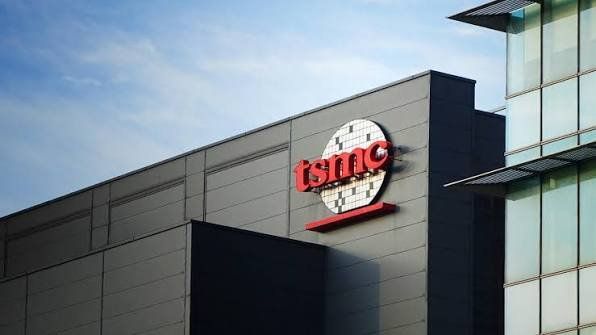 Exterior view of a TSMC building featuring the company's red logo.