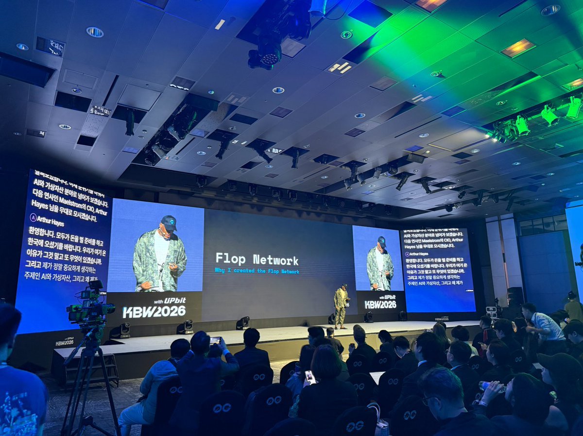 Arthur Hayes on stage presenting Flop Network at Korea Blockchain Week.