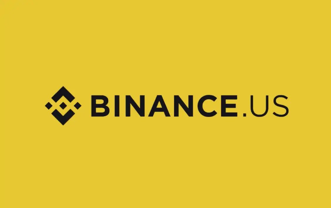 Binance.US logo displayed against a yellow background.