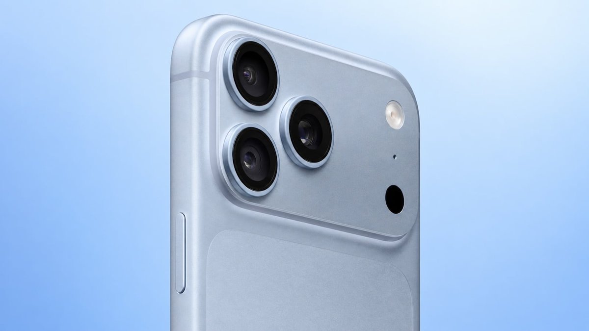 Close-up rendering of the rear camera module and upper corner of a light blue iPhone against a blue background.