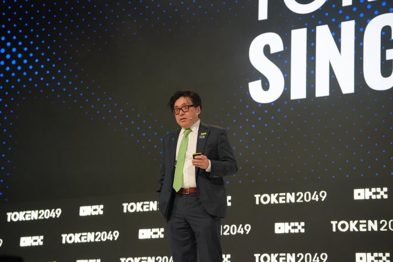 BitMine Chairman Tom Lee speaking on stage at the Token2049 conference in Singapore.