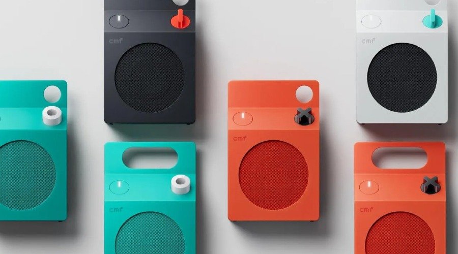 CMF portable wireless speakers shown in multiple colors including orange, teal, black, and white.