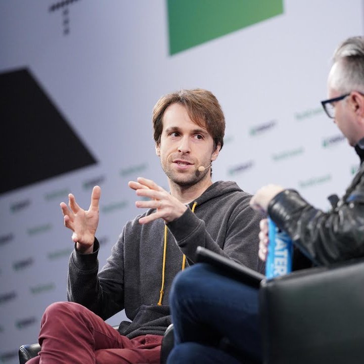 Photograph of Ethereum Foundation researcher Justin Drake speaking during a panel discussion.