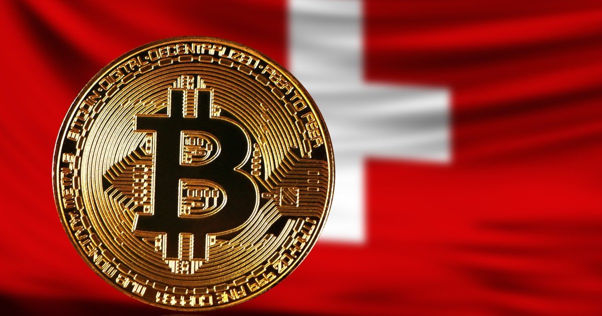 A physical Bitcoin coin set against the Swiss national flag.