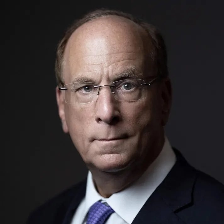 Portrait of BlackRock CEO Larry Fink wearing glasses and a suit.
