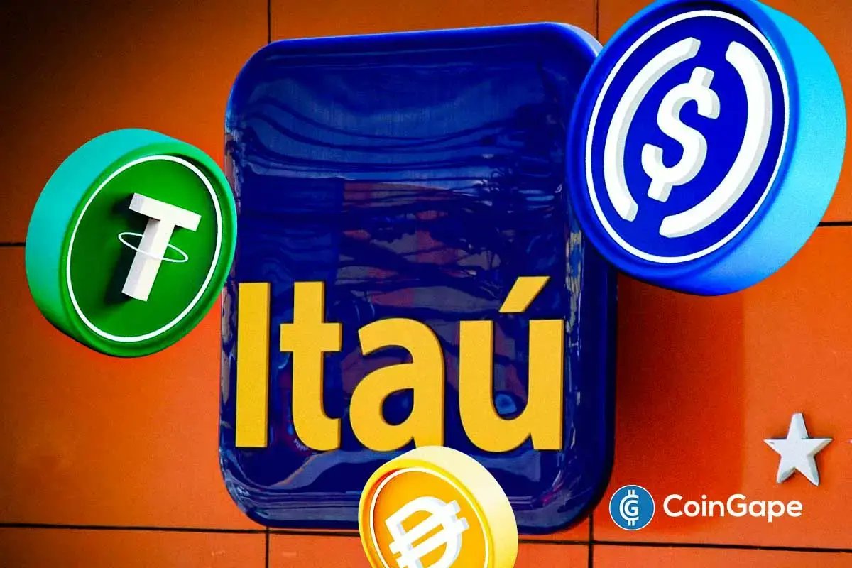 An Itaú logo sign flanked by 3D rendered cryptocurrency tokens against a building wall.