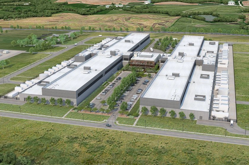 An aerial rendering of a large planned data center campus surrounded by green fields and trees.