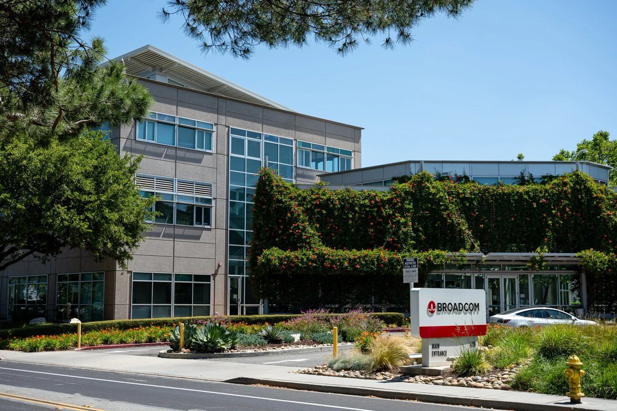 Exterior view of a Broadcom office building with the company sign in the foreground.